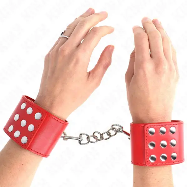KINK - POLSBANDJES MET VERSTELBARE DRUKSLUITING ROOD 19-24 CM X 5,5 CM