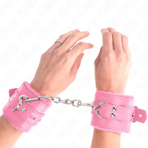 KINK - ROZE VIERKANTE GATEN GEVOERDE POLSBANDJES EN VERSTELBARE ROZE BAND 17-29 CM X 6 CM