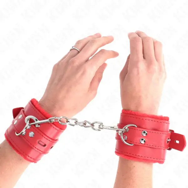 KINK - POLSBANDJES GEVOERD MET RODE VIERKANTE GATEN EN VERSTELBARE RODE BAND 17-29 CM X 6 CM